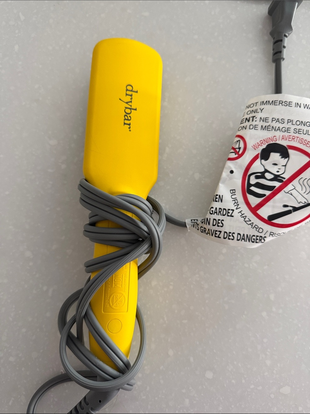 Drybar yellow mini flat iron brush with gray cord
